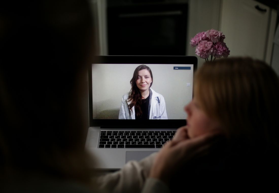 A provider appearing on a laptop screen